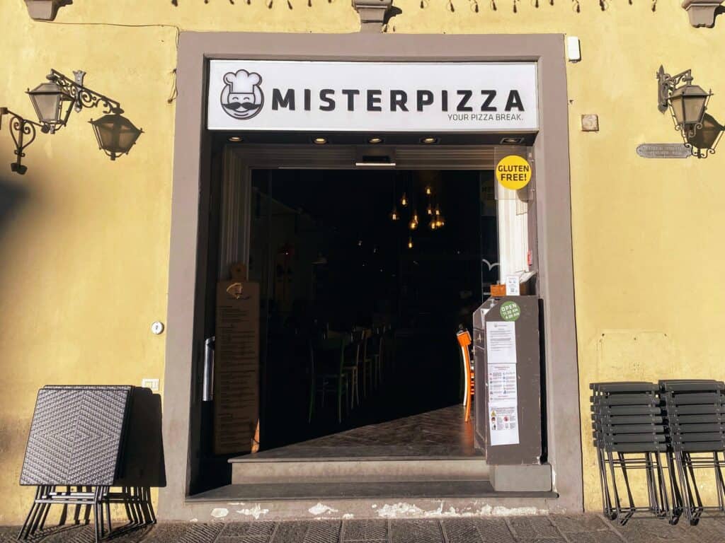 mister pizza restaurant from the outside view looking into the front entrance