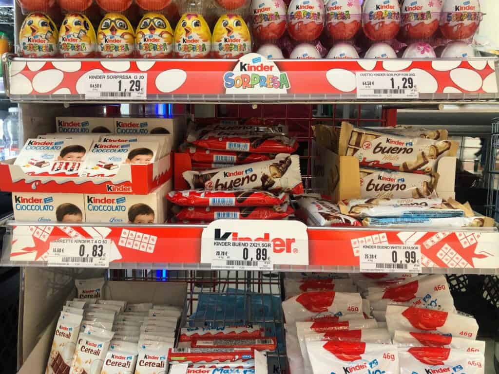Italian chocolate on display in the grocery store aisle in Italy.  All are Kinder brand products.