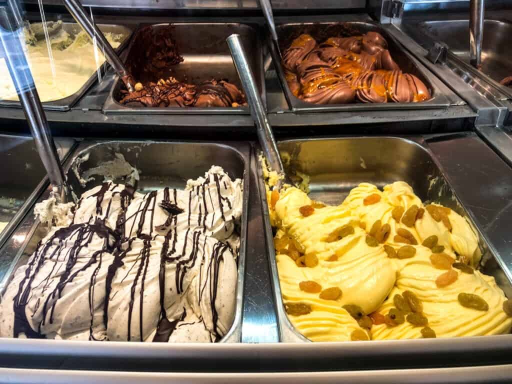Close up of malaga and stracciatella gelato in a gelateria in Florence, Italy.