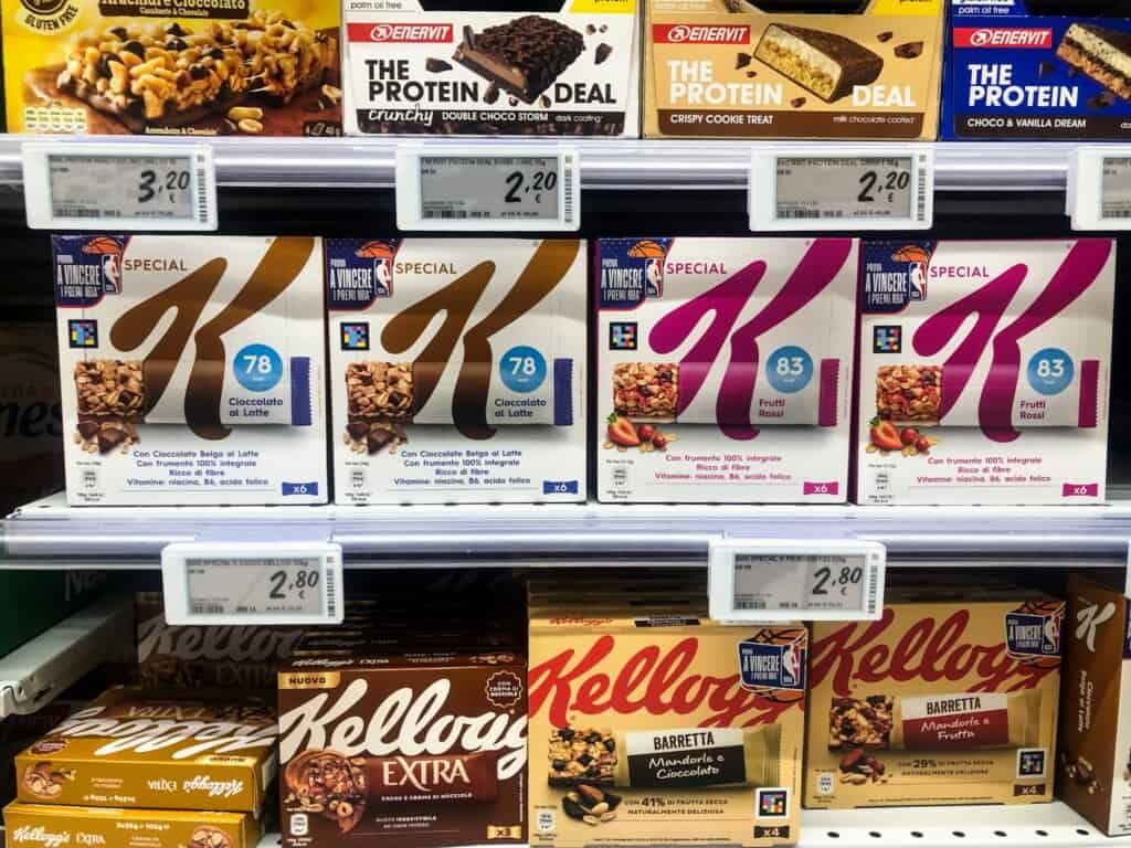 Close up of packages of granola bars and price tags at an Italian supermarket.