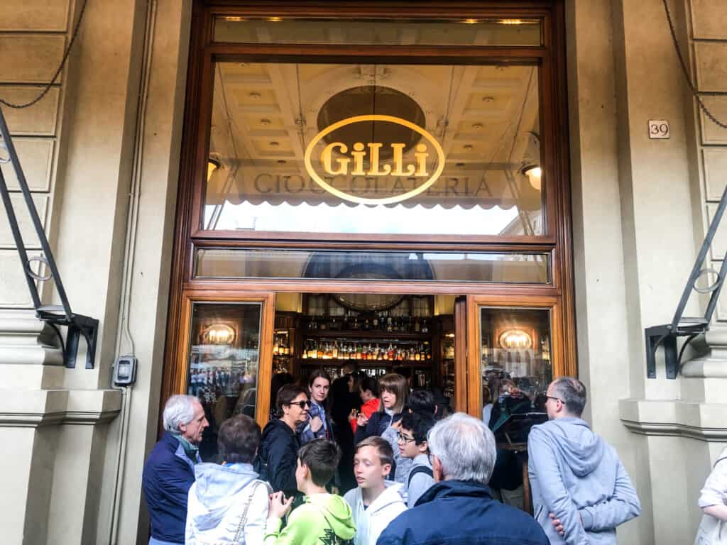People waiting in line (out the door) at Gilli Cafe in Florence, Italy.