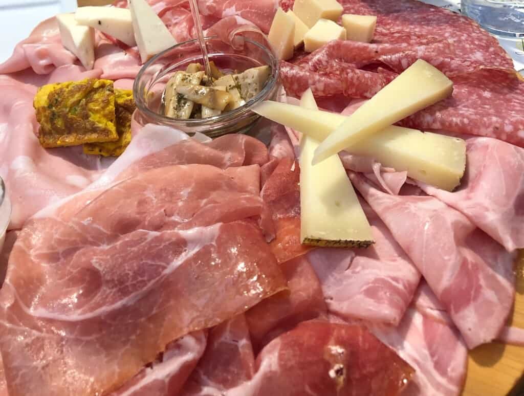 Platter of cured meats and cheeses in Italy.