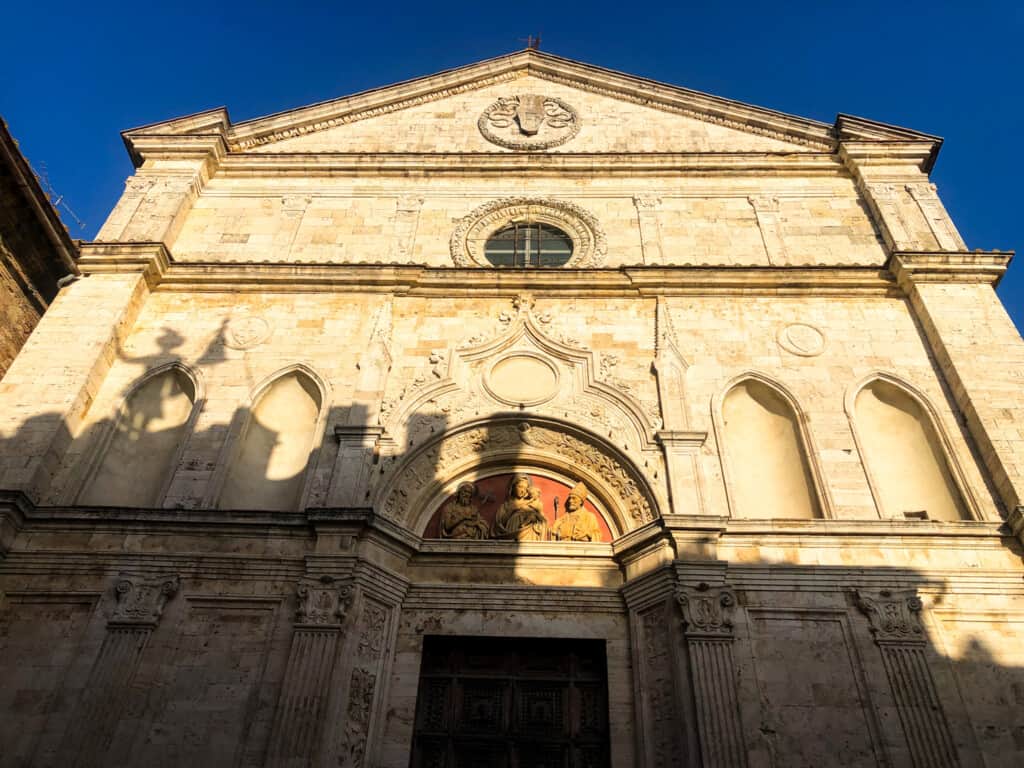 Facade of a stone church in Montepulciano, Italy.