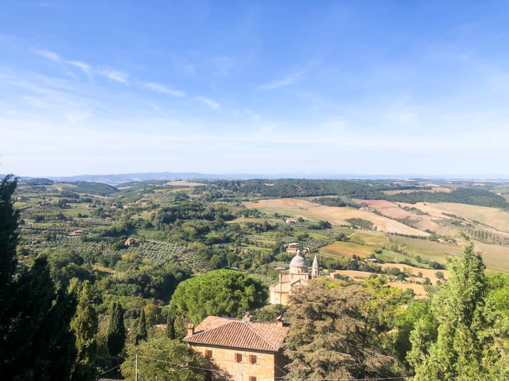 Panoramic view of Tuscan countryside and San Biagio Temple from Montepulciano, Italy.