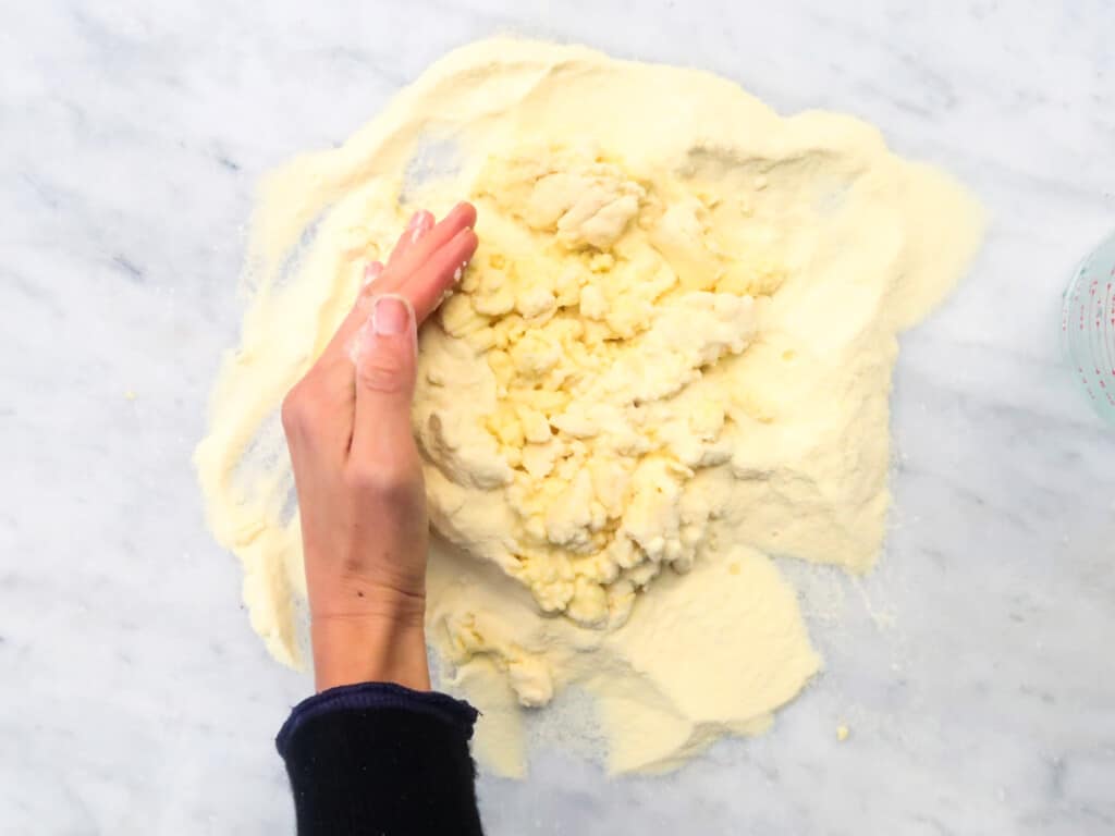 Hand forming dough for orecchiette pasta.