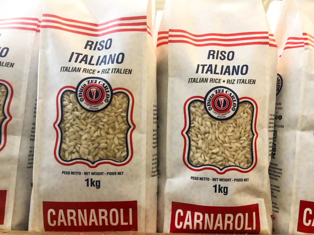 Small bags of carnaroli rice for sale at the Rialto Market in Venice, Italy.