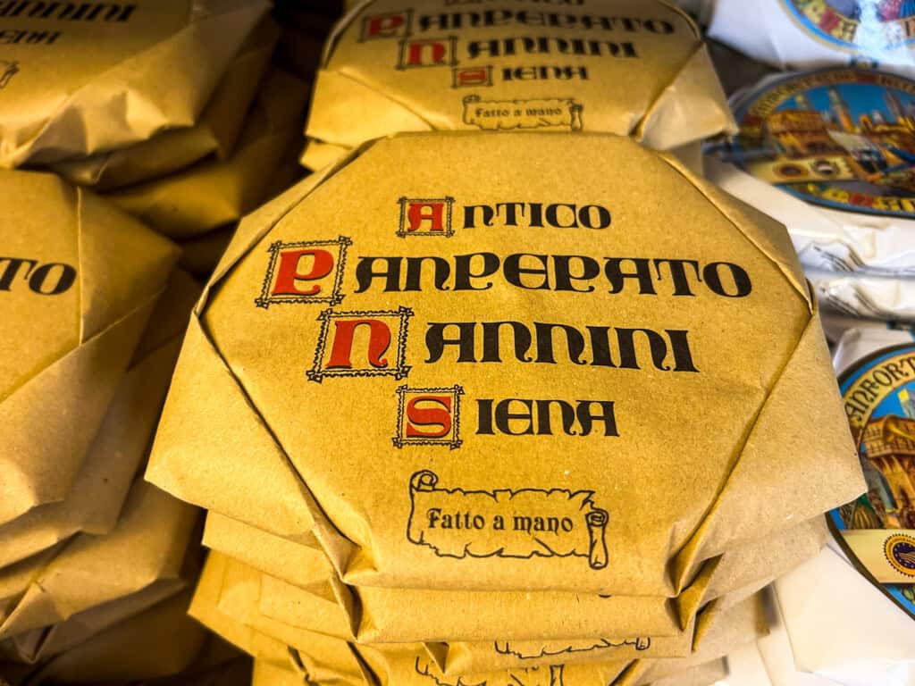 Paper wrapped stacks of panpepato in Siena, Italy.